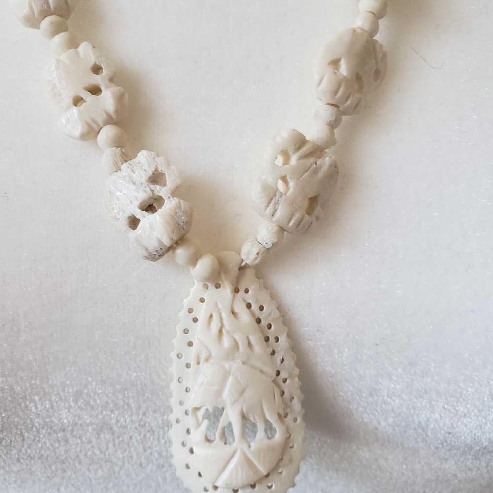 Rare find Cream Carved Bone Pendant